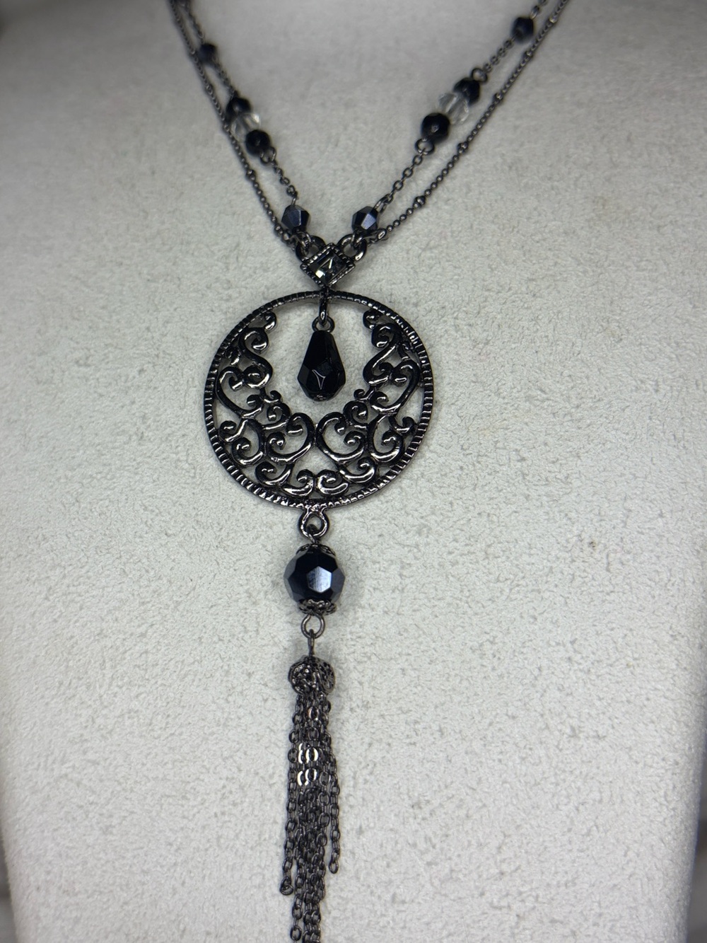 Cookie Lee Black Filigree Circle Tassel Necklace